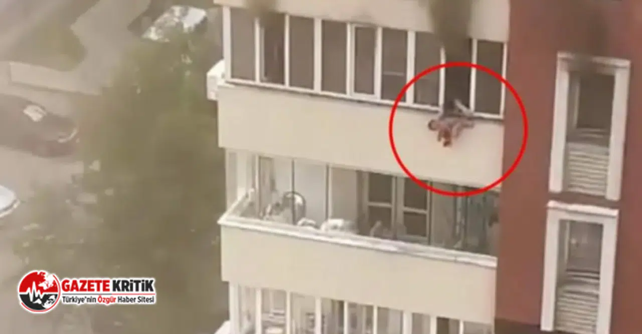 Çocuğunu alevler içinde kalan evin penceresinden attı