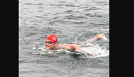 Otizmli yüzücü Tuna Tunca, 36 km'lik okyanus parkurunu başarıyla geçti!