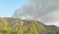 Marmaris'te orman yangınına 16 helikopterle yoğun müdahale sürüyor