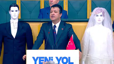 TBMM'de Arıkan, gençlerin evlilikteki ekonomik zorluklarını mankenlerle sergiledi