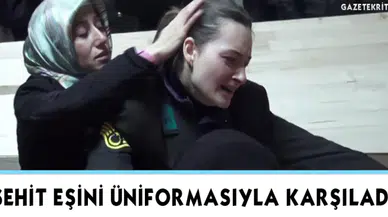 Şehit eşini üniformasıyla karşıladı