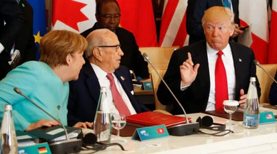 Trump ve Merkel birbirine girdi !