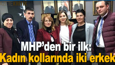 MHP'den bir ilk: Kadın kollarında iki erkek