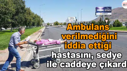 Ambulans verilmediğini iddia ettiği hastasını, sedye ile caddeye çıkardı